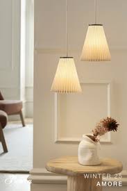 Amore 1 Lt Medium Pendant in Aged Brass w/Pleated White Linen Shade